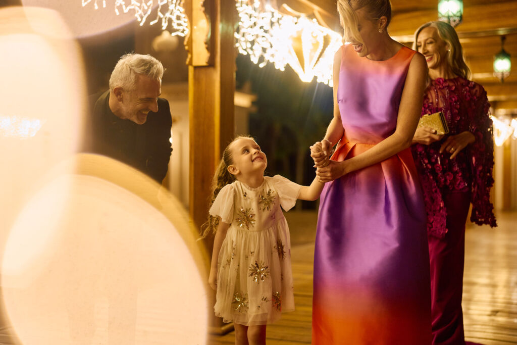 A family taking a stroll in the ground of the Madinat property