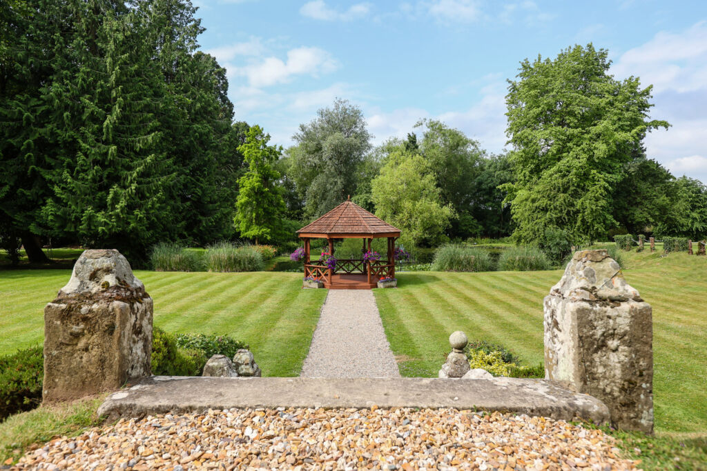 A photograph showing the lawned grounds