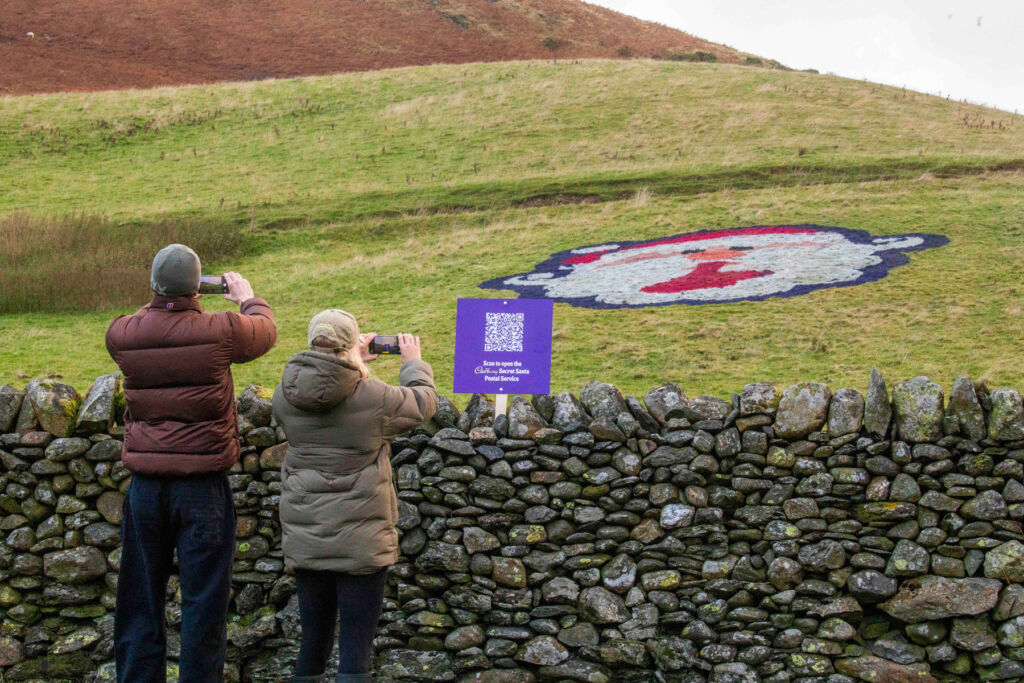 A couple photographing the festive face