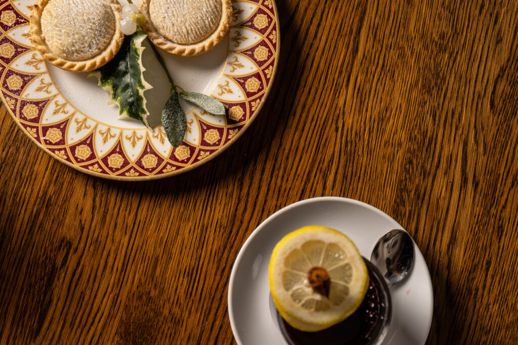 A top down view of mince pies on a plate