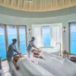 Guests enjoying a massage in the spa