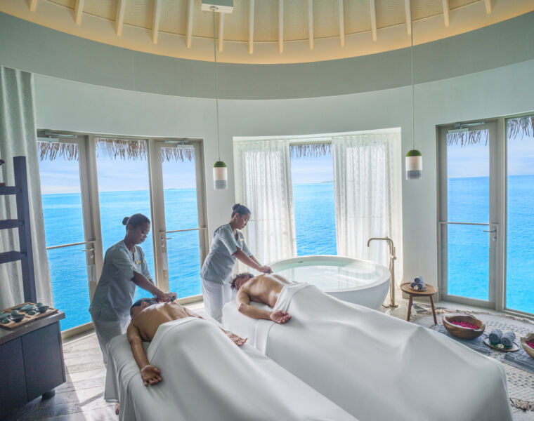 Guests enjoying a massage in the spa