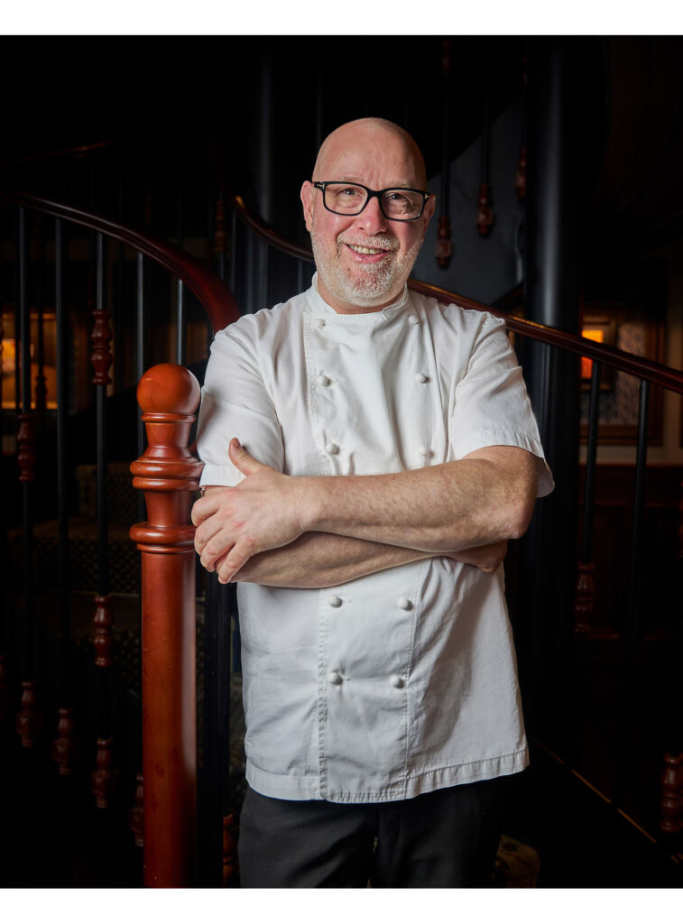 A photograph of Chef Alyn