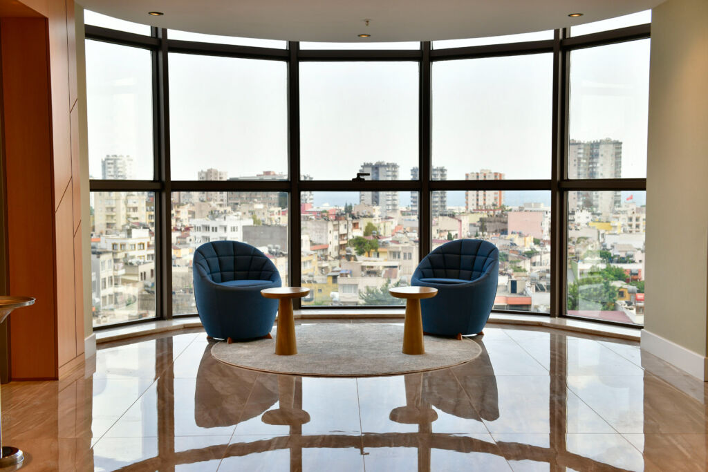 Chairs by the window offering views over the city