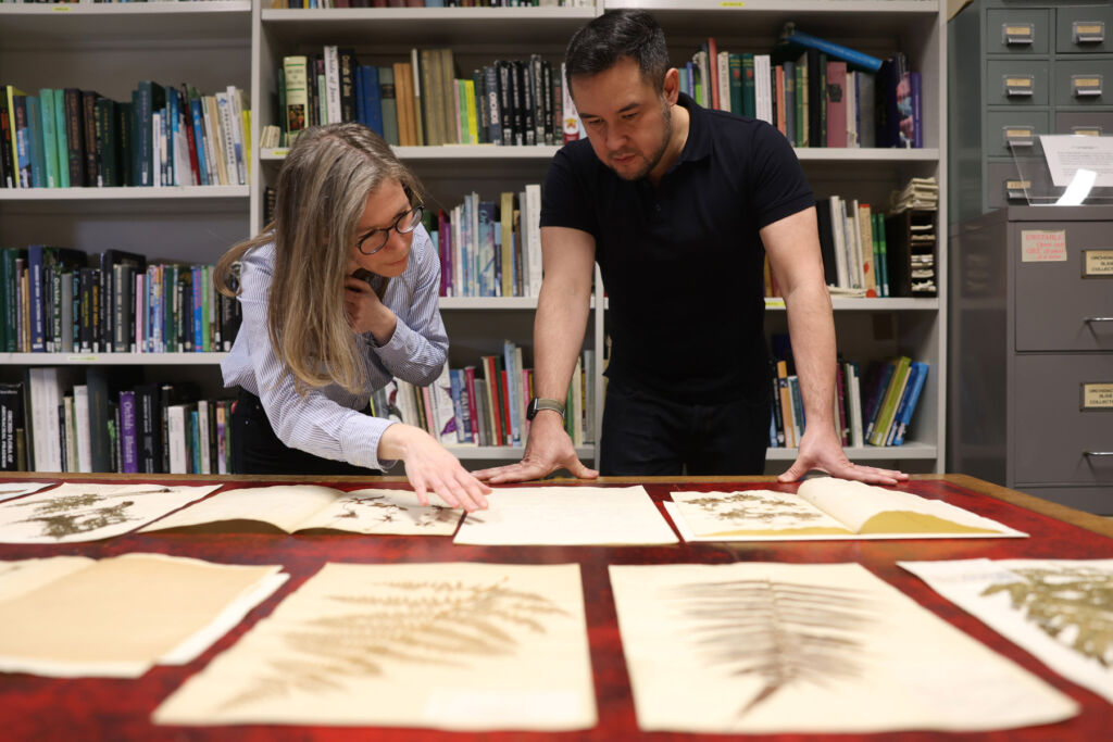 James inspecting some of the dried specimens