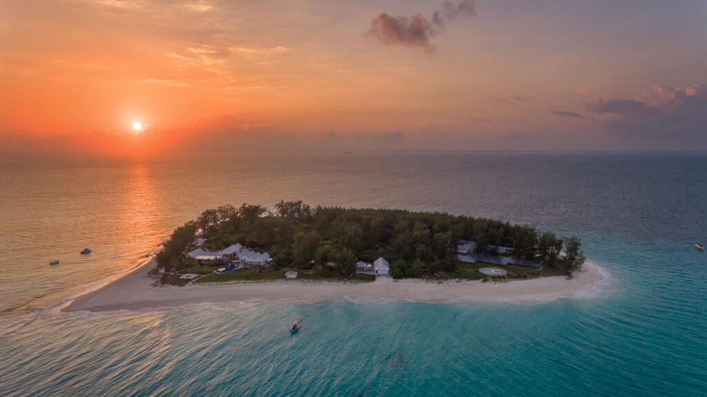 An aerial view of Thanda Island at sunset