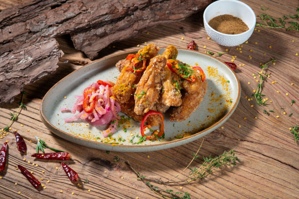 A plate of spiced chicken wings