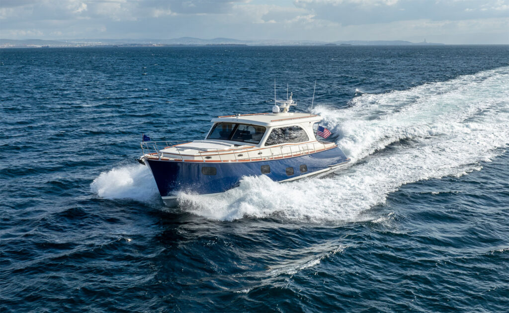 A photograph showing the boat travelling at speed on the sea