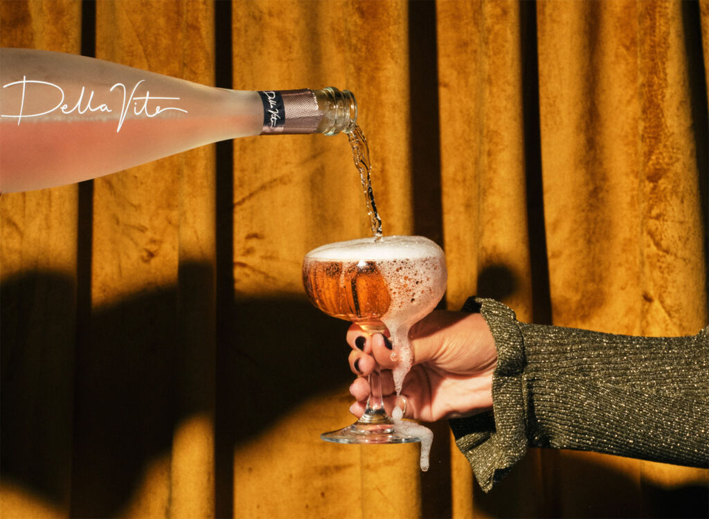 An overflowing glass of the Prosecco