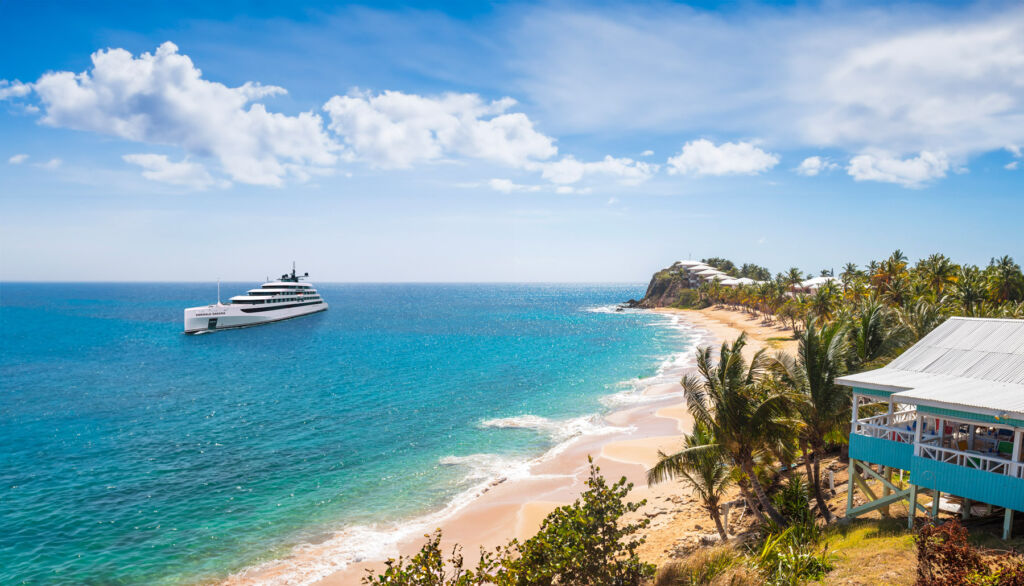 The boat moored off the beach