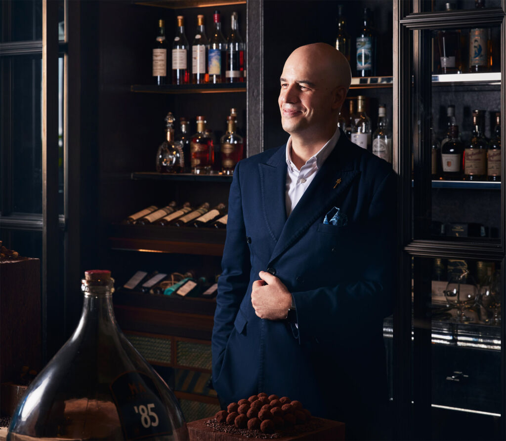 A photograph of Bob behind the bar