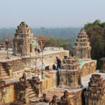 Workers restoring Phnom Bakheng