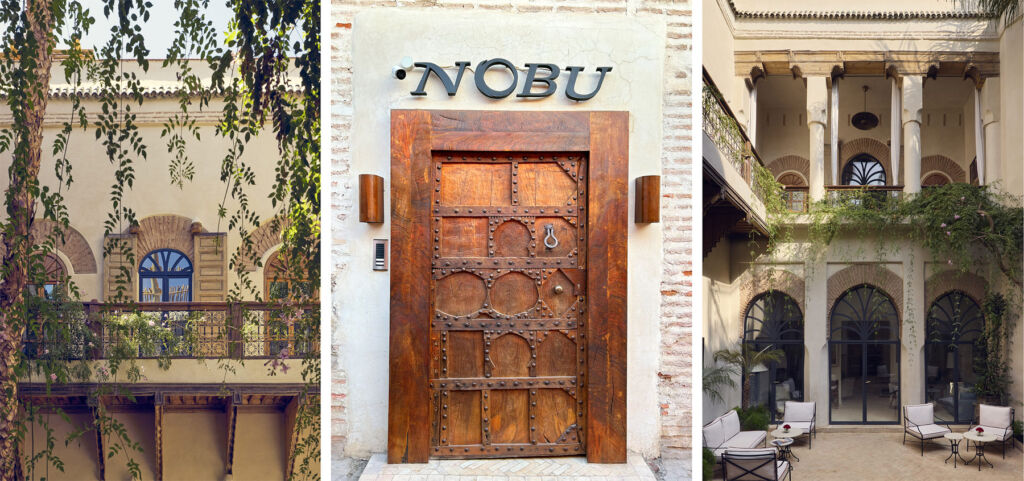 The entrance with the hotel name above it and two photographs of the courtyard