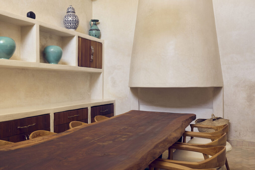 The wood table in the ground floor dining room