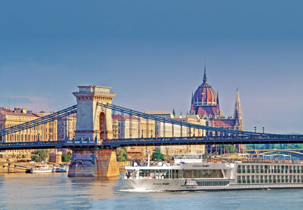 One of the company's boats cruising along the river