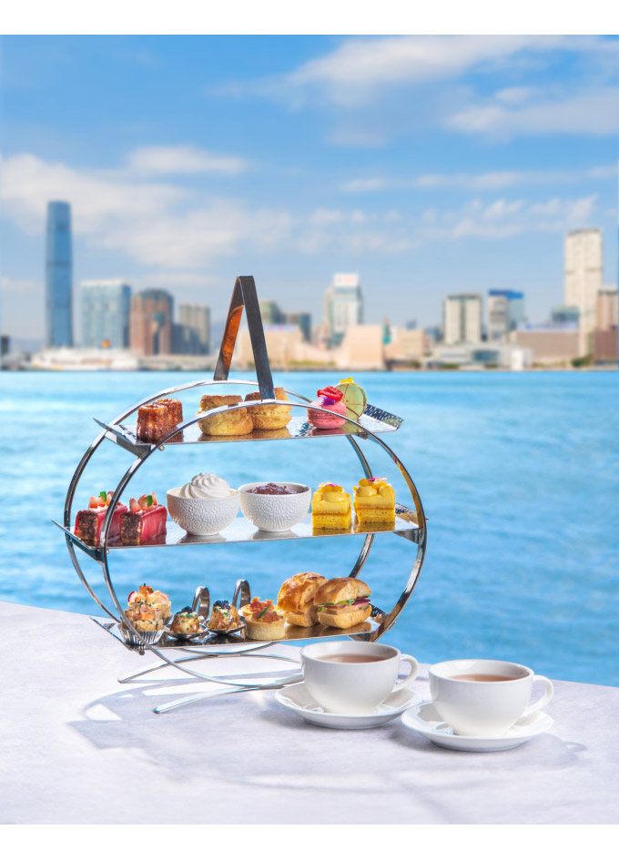 The afternoon tea with Hong Kong's skyscrapers in the background