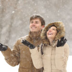 A couple enjoying the snow