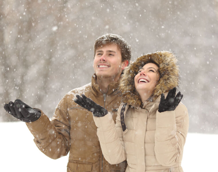 A couple enjoying the snow