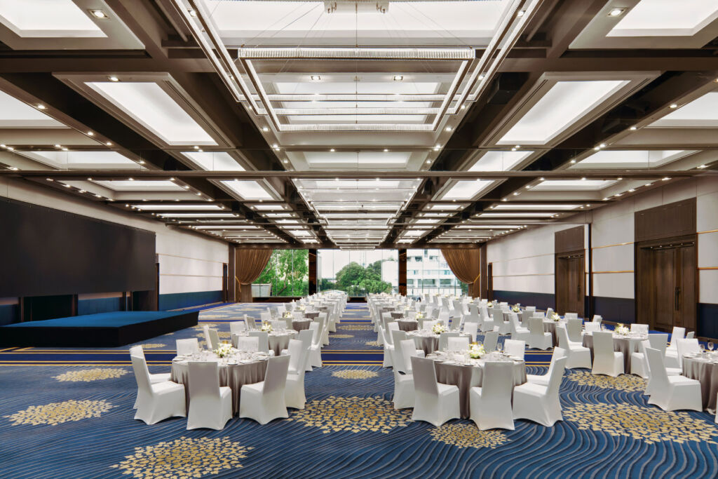 Tables laid out inside one of the large event spaces