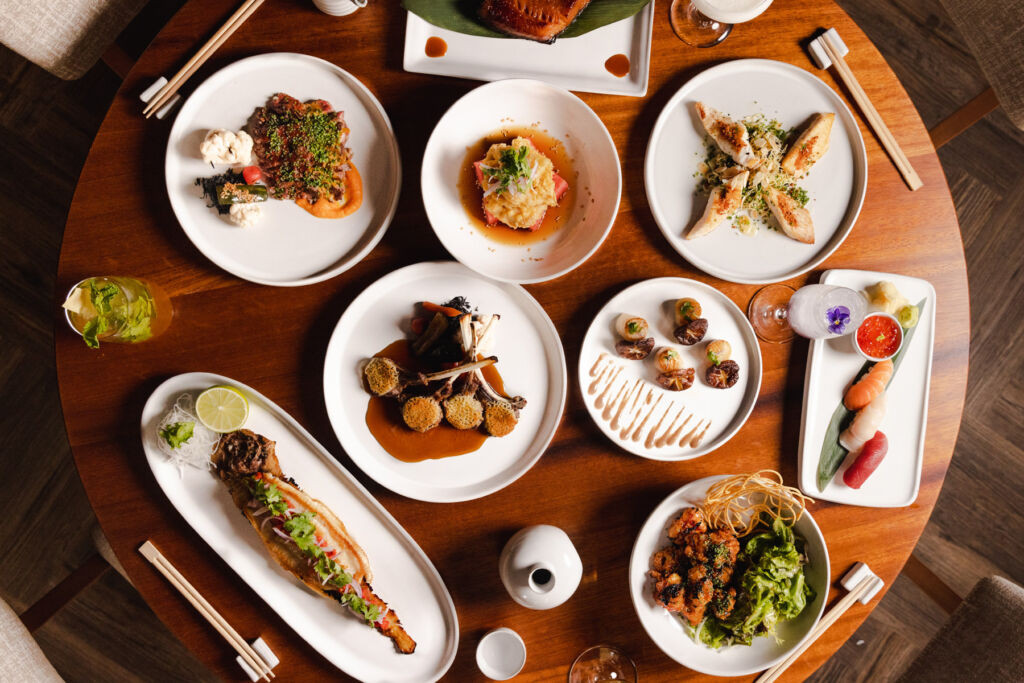 A top down view of a selection of the restaurant's dishes on a table