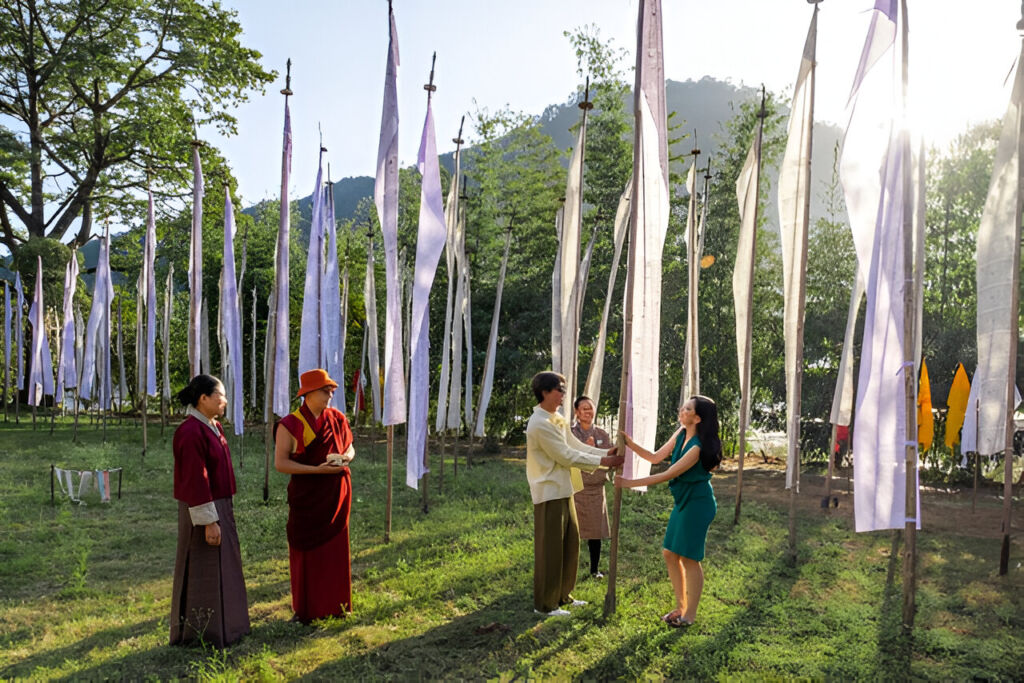 Guests taking part in a flag hoisting ceremony