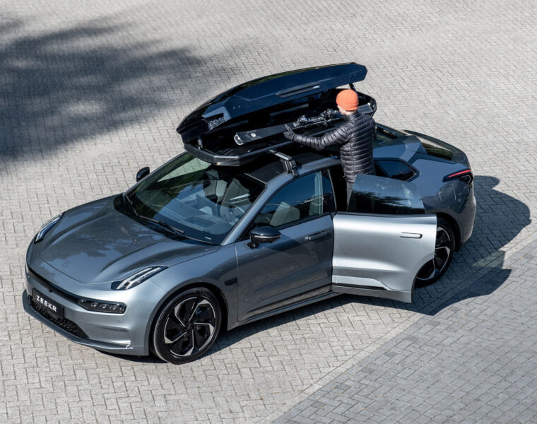 A driver readying his car for a journey